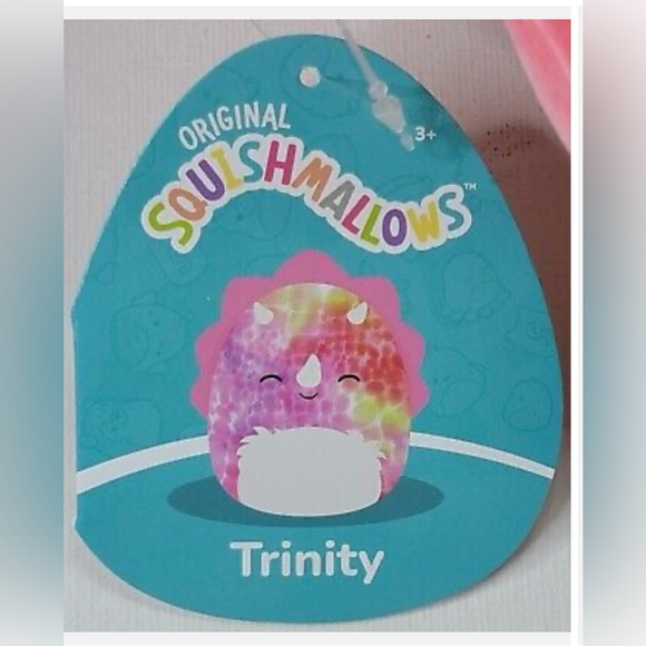 Squishmallow Trinity the Pink Triceratops. Trinity is a tie-dyed dinosaur - Picture 6 of 8